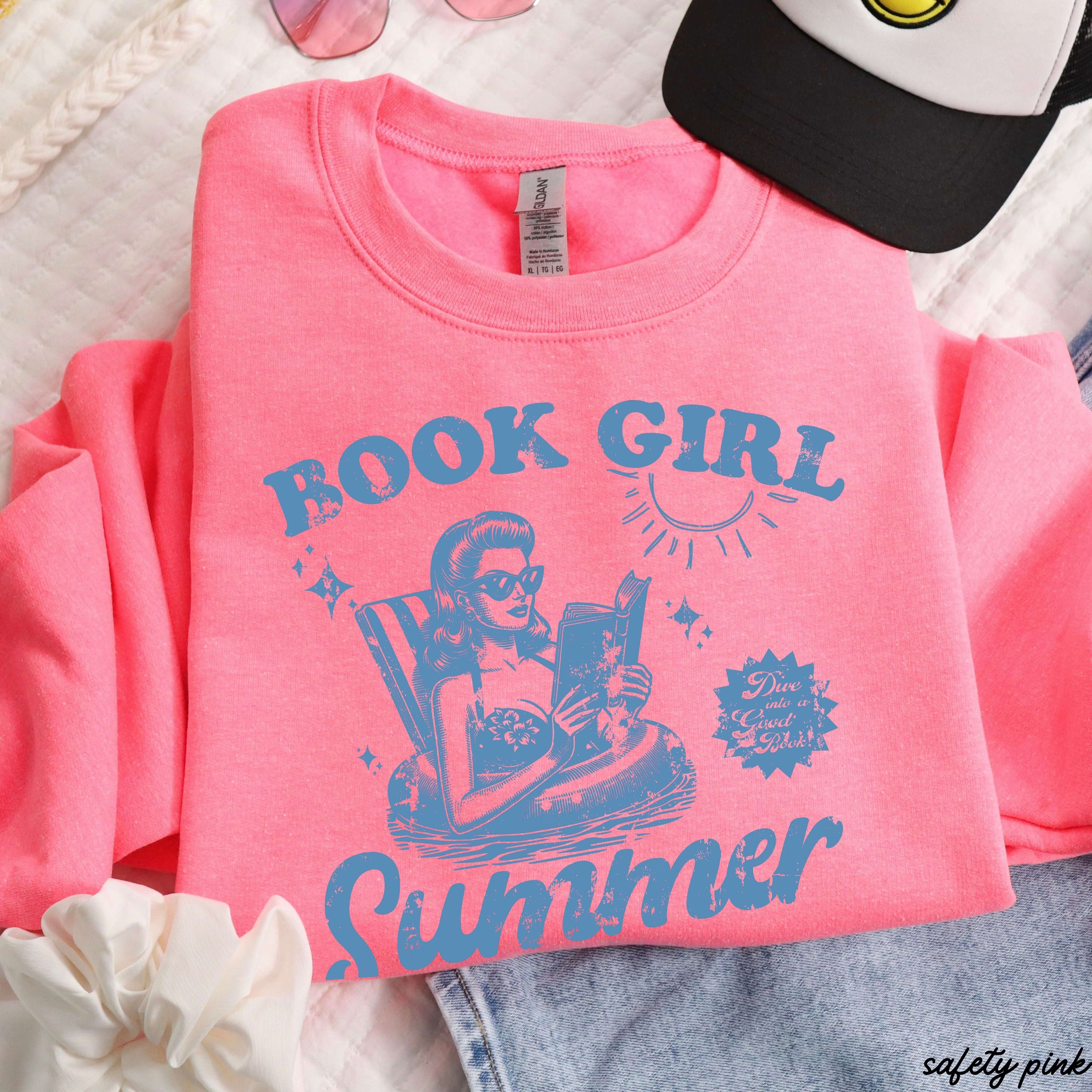 Book Girl Summer Sweatshirt 5 Colors S-3X in safety pink with graphic design of a girl reading, unisex comfy fit.
